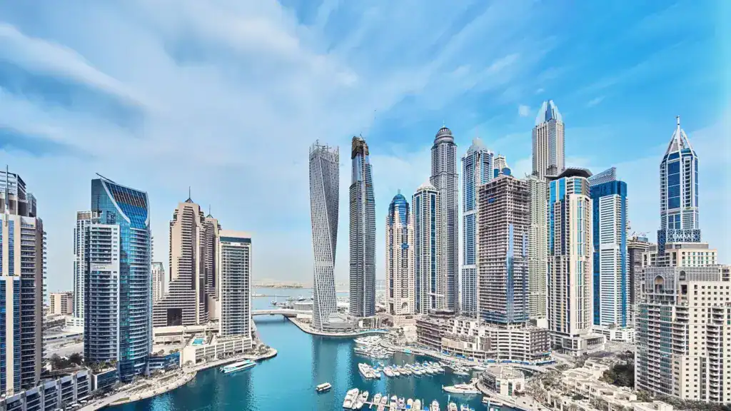 Luxurious waterfront skyscrapers in downtown Dubai, showcasing modern high-rise architecture with marina views, ideal for real estate investments and luxury living.