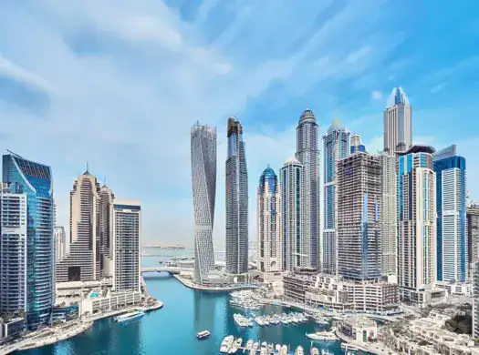 Luxurious waterfront skyscrapers in downtown Dubai, showcasing modern high-rise architecture with marina views, ideal for real estate investments and luxury living.