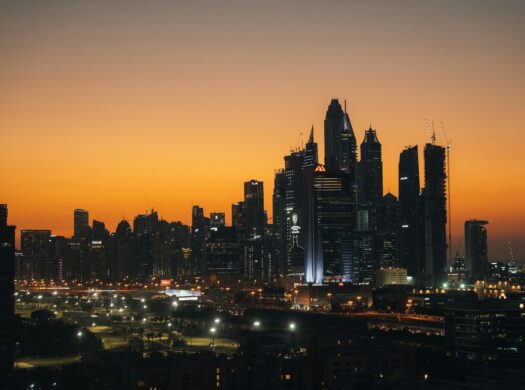 City skyline with skyscrapers at sunset